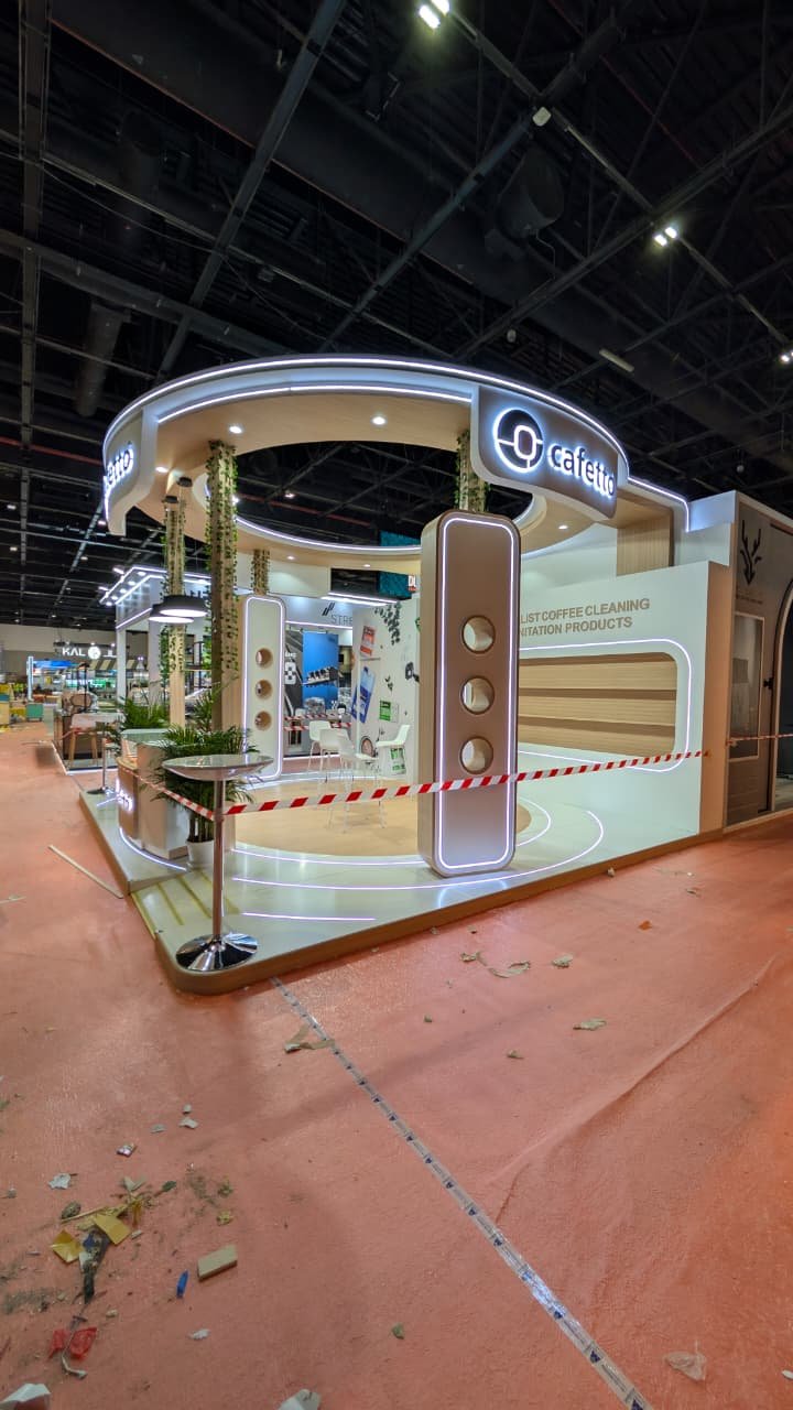 Cafetto Organic Curved Wooden Stand at World of Coffee Dubai by Infinity Exhibit